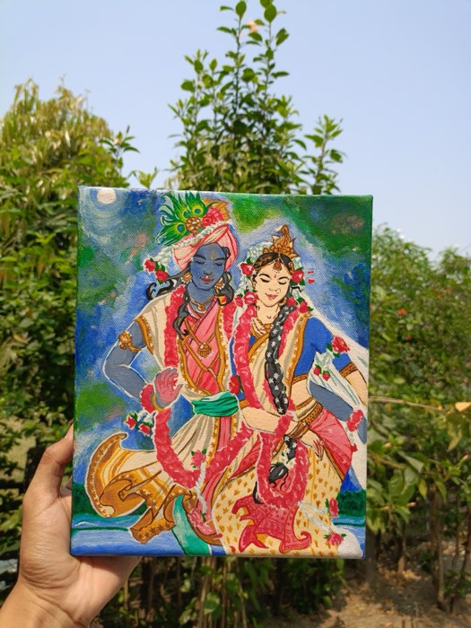 Radha and Krishna painted in a traditional style in acrylic